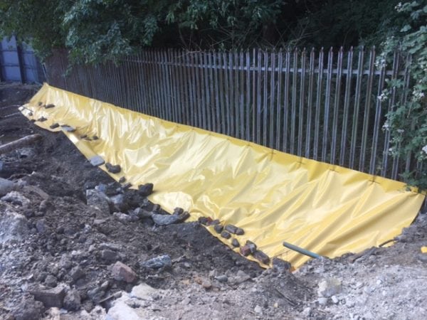 Japanese knotweed barrier membrane laid to stop any growth of this invasive plant returning