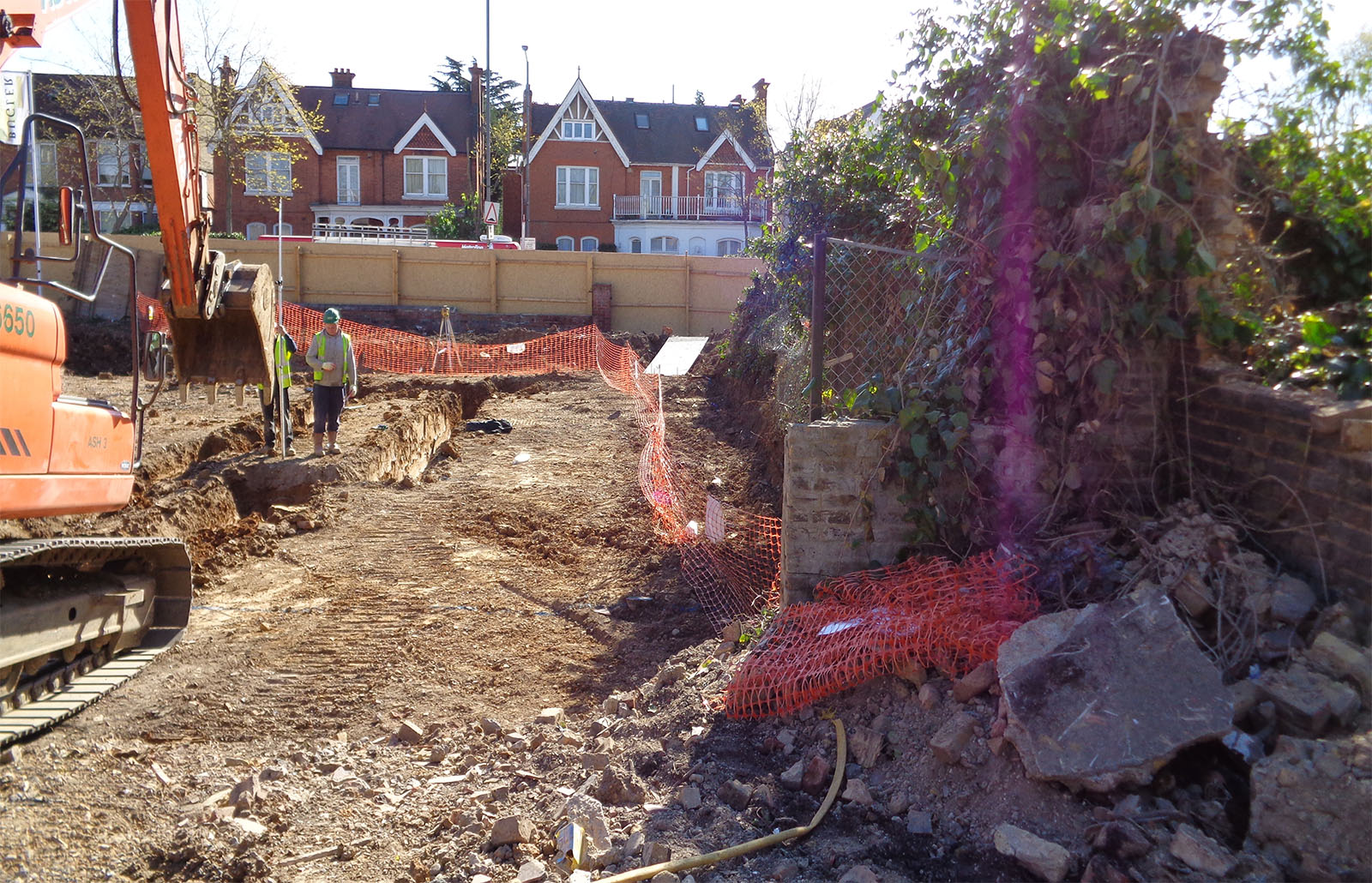 Workers managing brownfield site